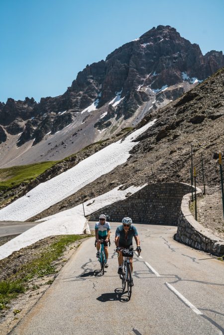 Cycling up to the Col du Galibier with snow by the roadside despite the scorching June weather. Photo by Gwilym Thomas